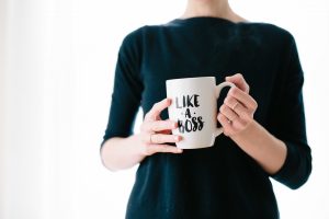 Business lady with boss mug